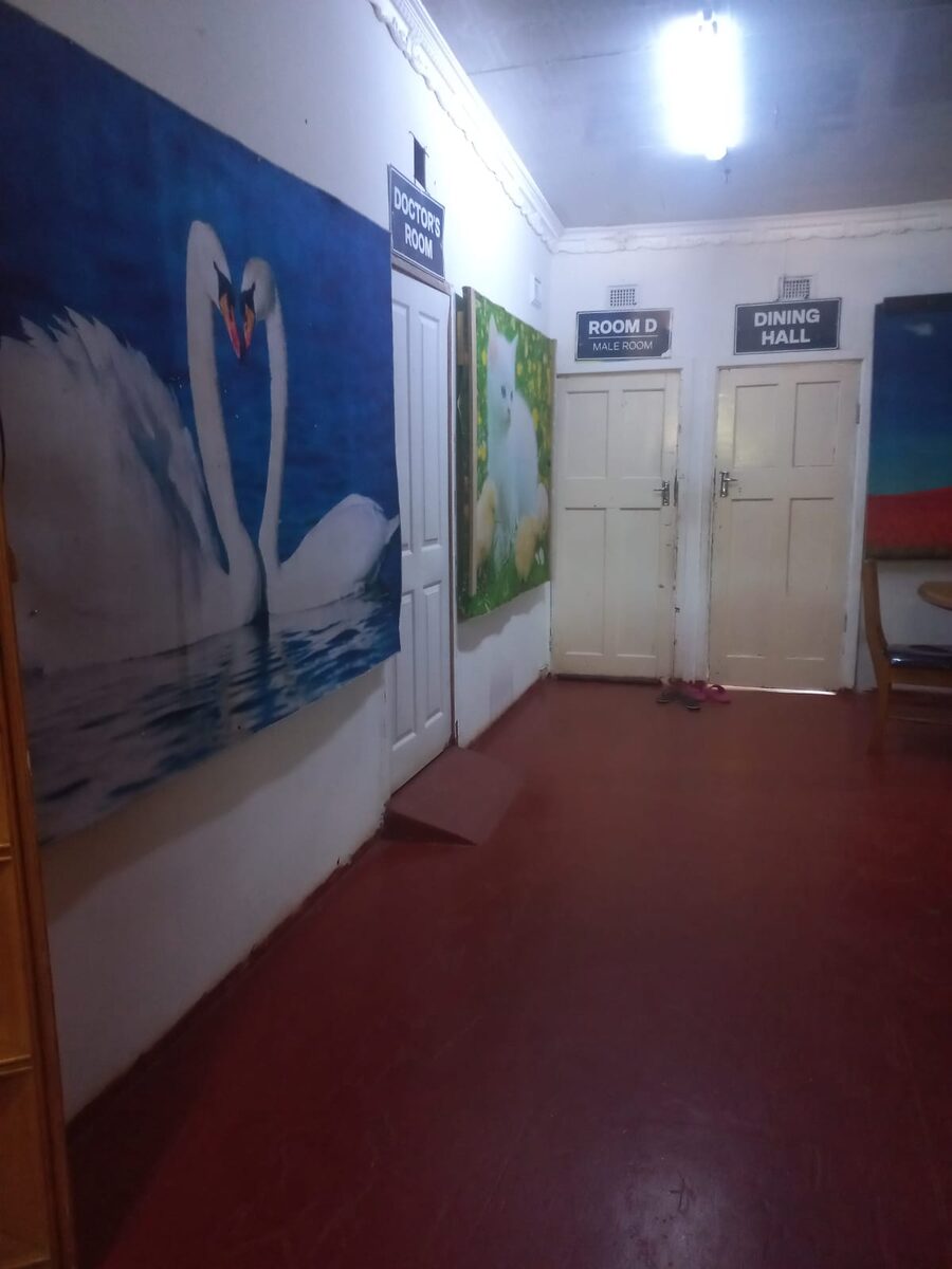 Corridor inside the care centre leading to the dining hall and doctor's room